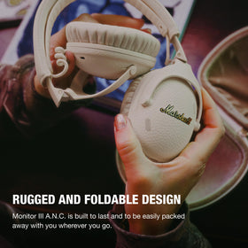 Marshall Monitor III A.N.C. foldable cream case shown for on-the-go protection.