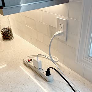 Maxxima outlet detail showing three-prong grounded sockets for safer device connection