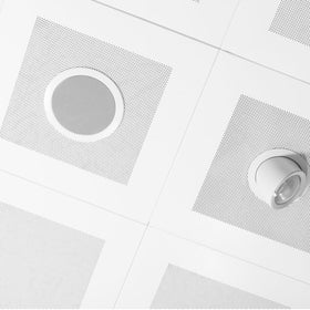 MECCANIXITY lifestyle home theater install showing discreet speaker protection