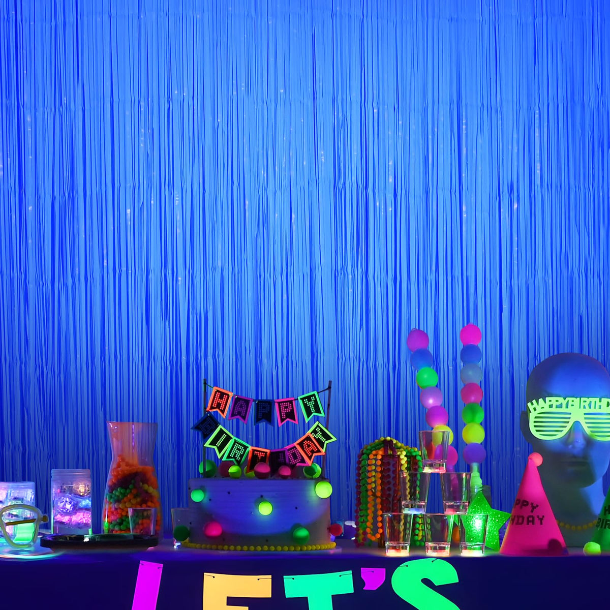 Close-up of Mega-L Glow curtains' tinsel texture for festive sparkle.