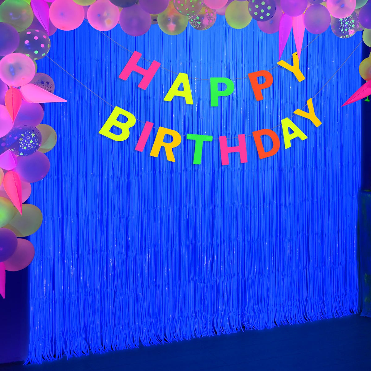 Dessert table backdrop with Macaron Blue foil fringe by Mega-L Glow.