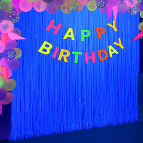 Dessert table backdrop with Macaron Blue foil fringe by Mega-L Glow.