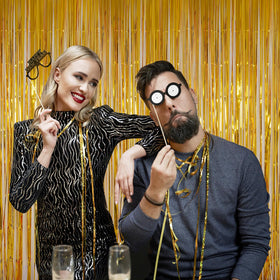 Melsan 3.2 x 8.2 ft gold fringe backdrop ideal for photos.