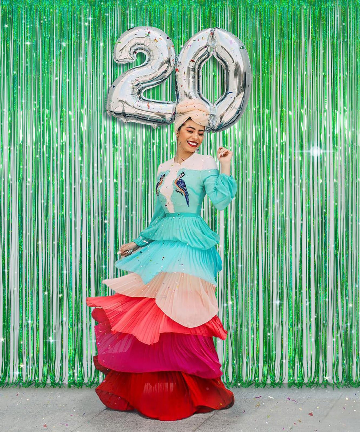 Melsan photo booth setup with props showing vibrant green background for pictures