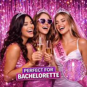 Melsan photo booth setup with couple posing against shiny pink backdrop