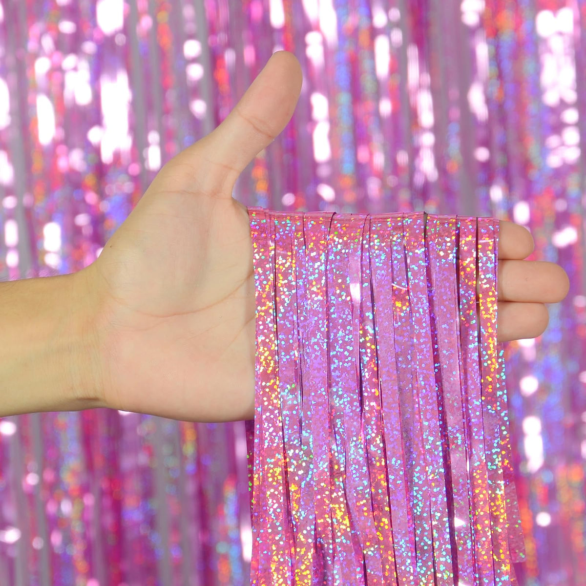 Melsan tinsel strands moving to show photogenic shimmer and motion