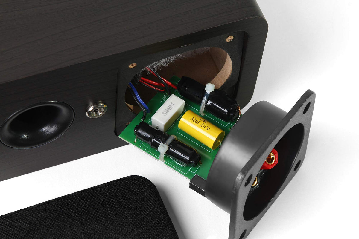 Micca OoO wall-mounted as surround speakers, offers flexible placement for home theater systems