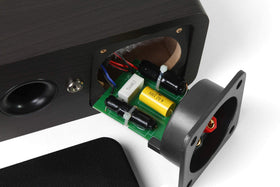 Micca OoO wall-mounted as surround speakers, offers flexible placement for home theater systems