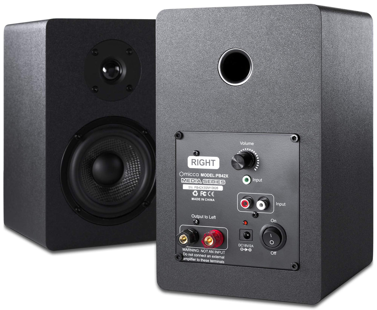 Micca PB42X pair on a compact desk setup for near-field listening.