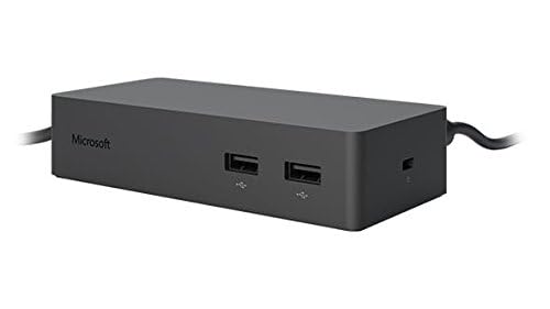 Microsoft Surface Dock back view shows cable organization and port layout.