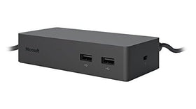 Microsoft Surface Dock back view shows cable organization and port layout.