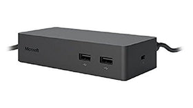 Microsoft Surface Dock ethernet port ready for wired networking in a desk setup.