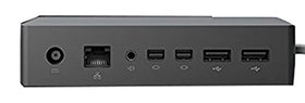 Microsoft Surface Dock front view showing the sleek black chassis for a desktop-style setup.