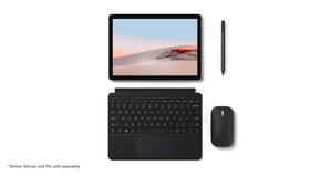 Microsoft Surface Go Type Cover closeup of backlit keys and texture for accurate typing in low light