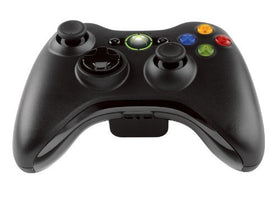 Microsoft Xbox 360 controller closeup of buttons and guide button offering precise control benefit