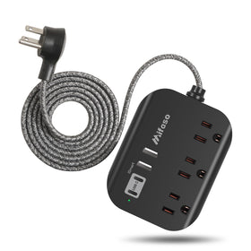 Mifaso power strip with USB ports on a desk for tidy charging.
