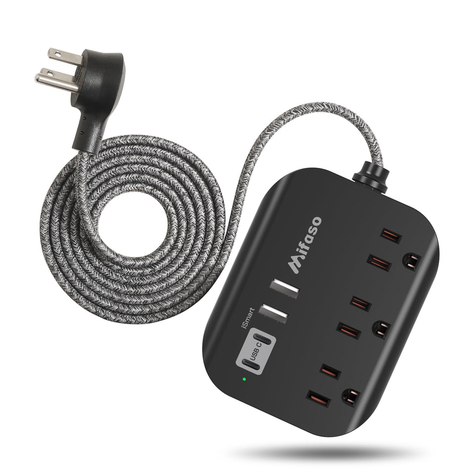 Mifaso power strip with USB ports on a desk for tidy charging.