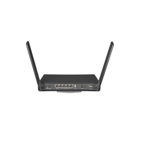 MikroTik back ports and label showing five gigabit Ethernet and PoE support
