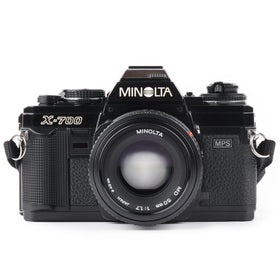 Minolta X-700 camera body viewed front, highlighting ergonomic controls for quick shooting.