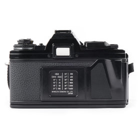 Minolta X-700 with PC flash port suits studio and on-location setups.