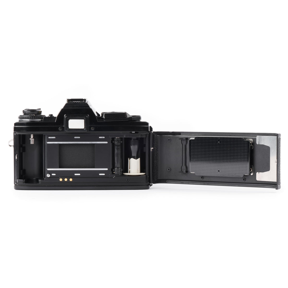 Minolta X-700 self-timer and beeper assist steady hands-free shooting.
