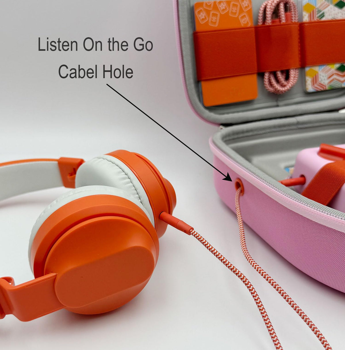 Miojoy cable hole detail with headphones plugged for on-the-go listening
