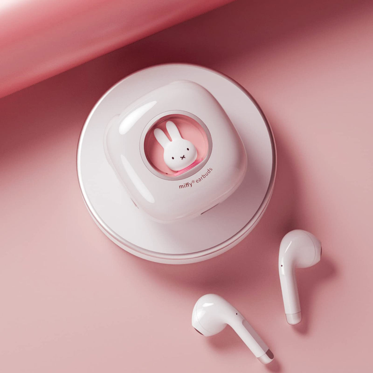 MIPOW Miffy earbud worn during a run demonstrating secure fit and sweat resistance benefit