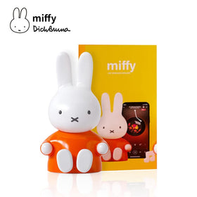 Mipow Miffy figurine with extended feet doubles as a convenient phone stand.
