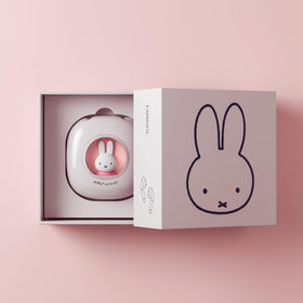 MIPOW Miffy earbuds used at a cafe illustrating clear audio and everyday on-the-go convenience