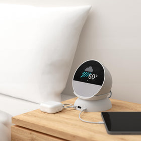 Mission Cables stand in use on bedside table illustrating organized charging benefit