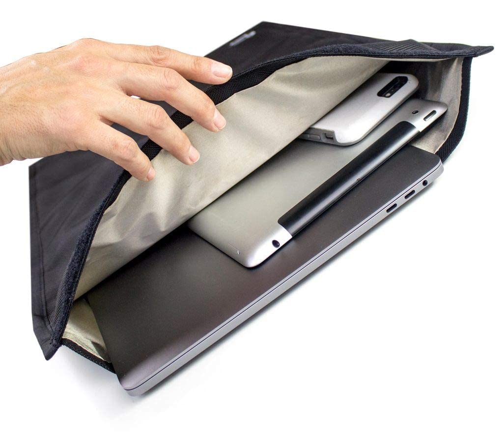 Mission Darkness Faraday bag universal fit demonstrates compatibility with laptops and tablets.