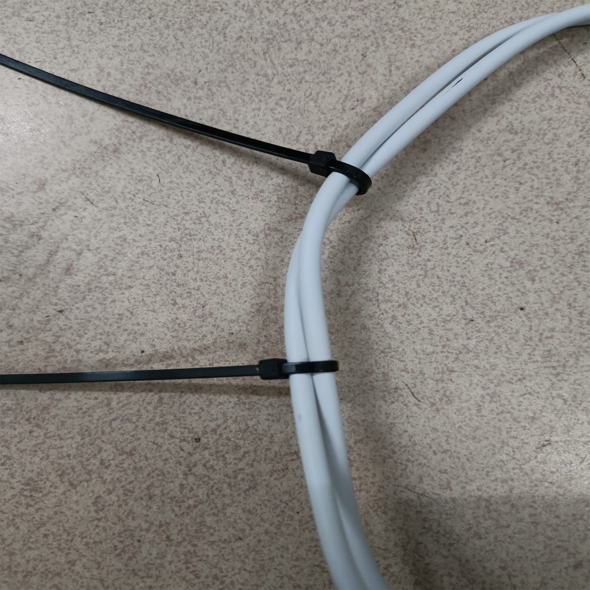 Miwutz garden organization with zip ties tidies hoses and plant supports.
