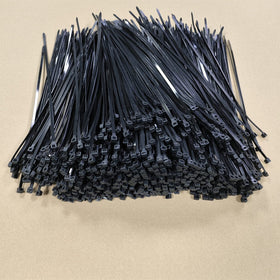 Miwutz heavy-duty hanging with zip ties securing tools and outdoor decor.