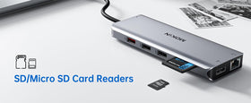 MOKiN compact docking station next to a notebook showing portable size and desk-friendly design