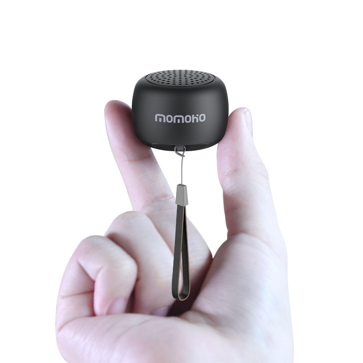 MOMOHO small black mini Bluetooth speaker showing pocket-ready design for travel.