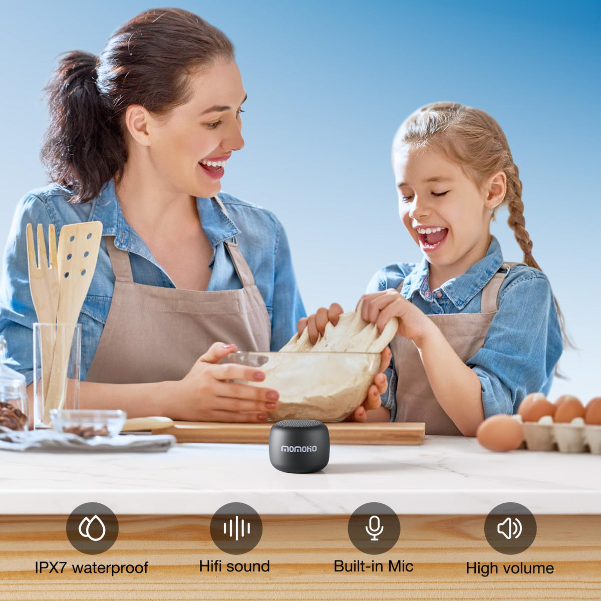 MOMOHO mini Bluetooth speaker black finish highlighting dustproof and stylish fit.