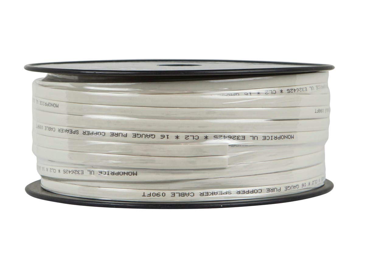 Monoprice flat speaker wire routed behind TV and baseboard for discreet, low-profile installation benefit