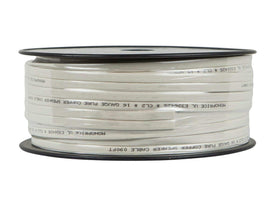 Monoprice flat speaker wire routed behind TV and baseboard for discreet, low-profile installation benefit