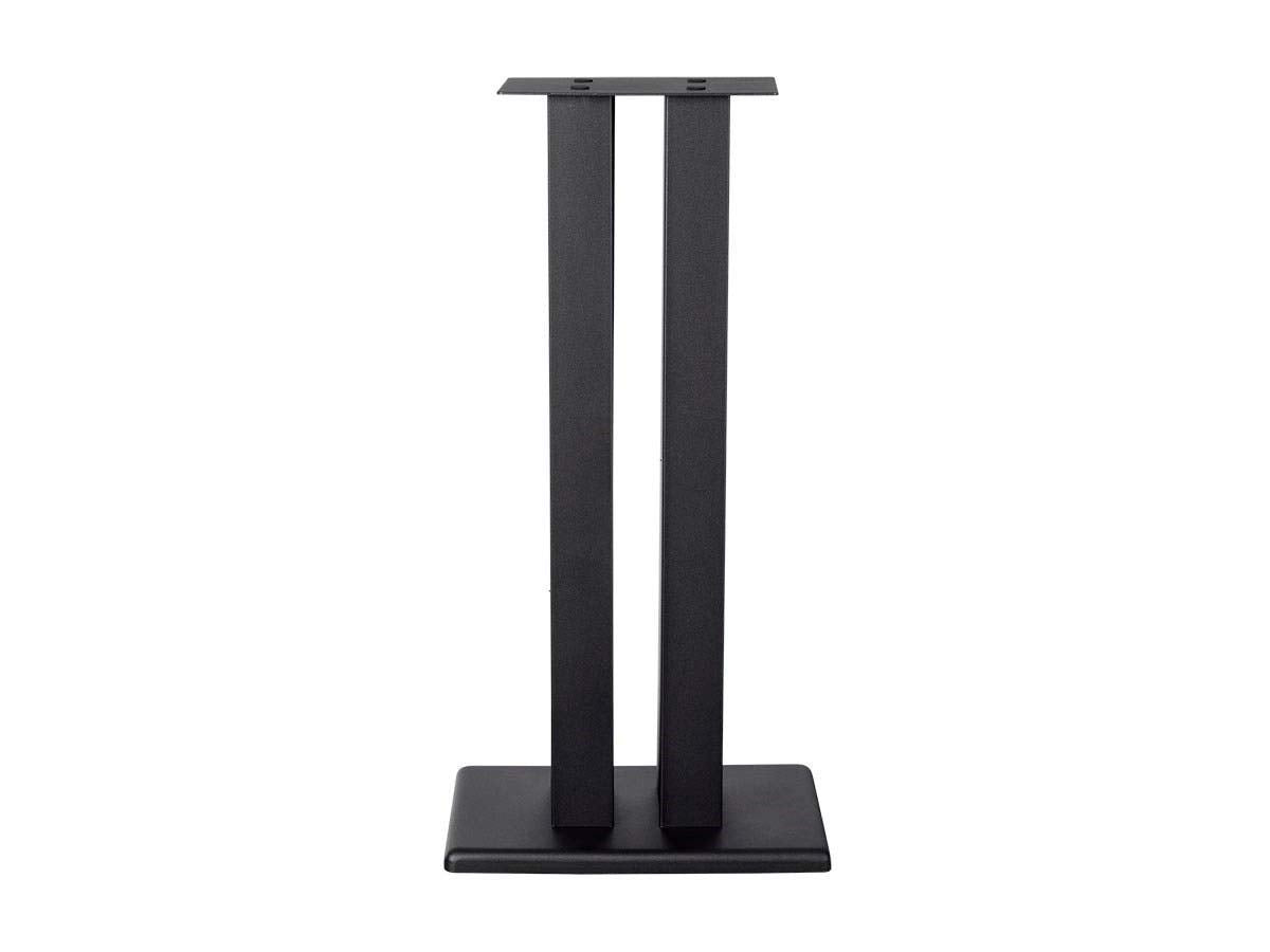 Close-up of adjustable spikes on Monoprice Monolith stand for carpet isolation.