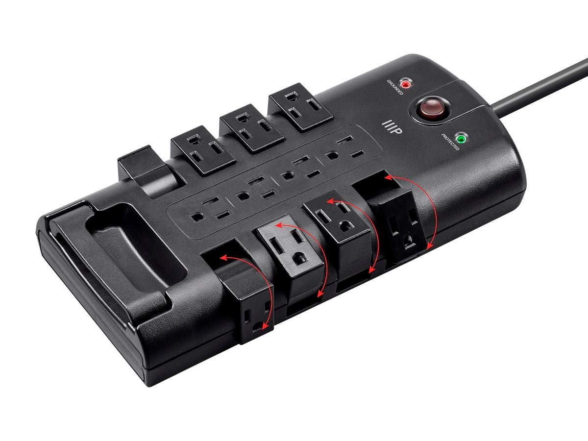 Monoprice power block powering TV and console in living room demonstrating neat cable management and surge protection