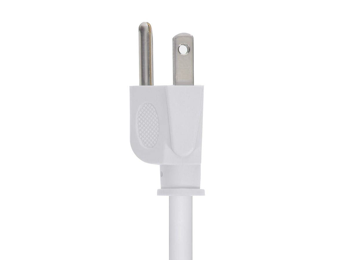 Coiled Monoprice 10 ft white power cord for easy storage