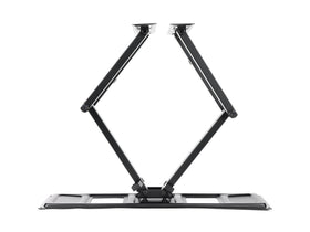 Monoprice side profile retracted against wall, highlighting space-saving low-profile benefit