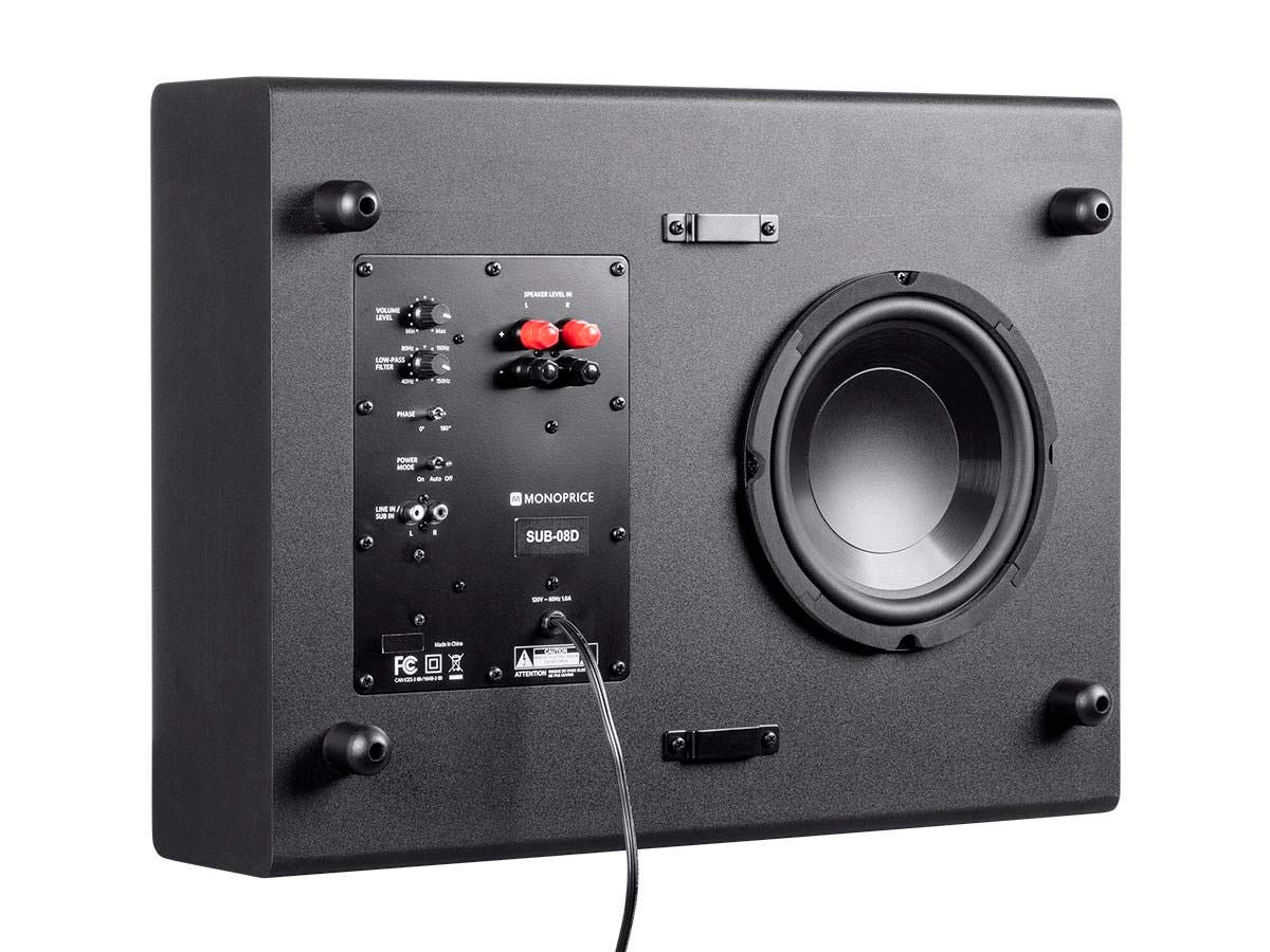 Monoprice SSW-8 mounted behind TV stand for clean, low-profile audio.