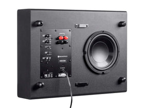 Monoprice SSW-8 mounted behind TV stand for clean, low-profile audio.