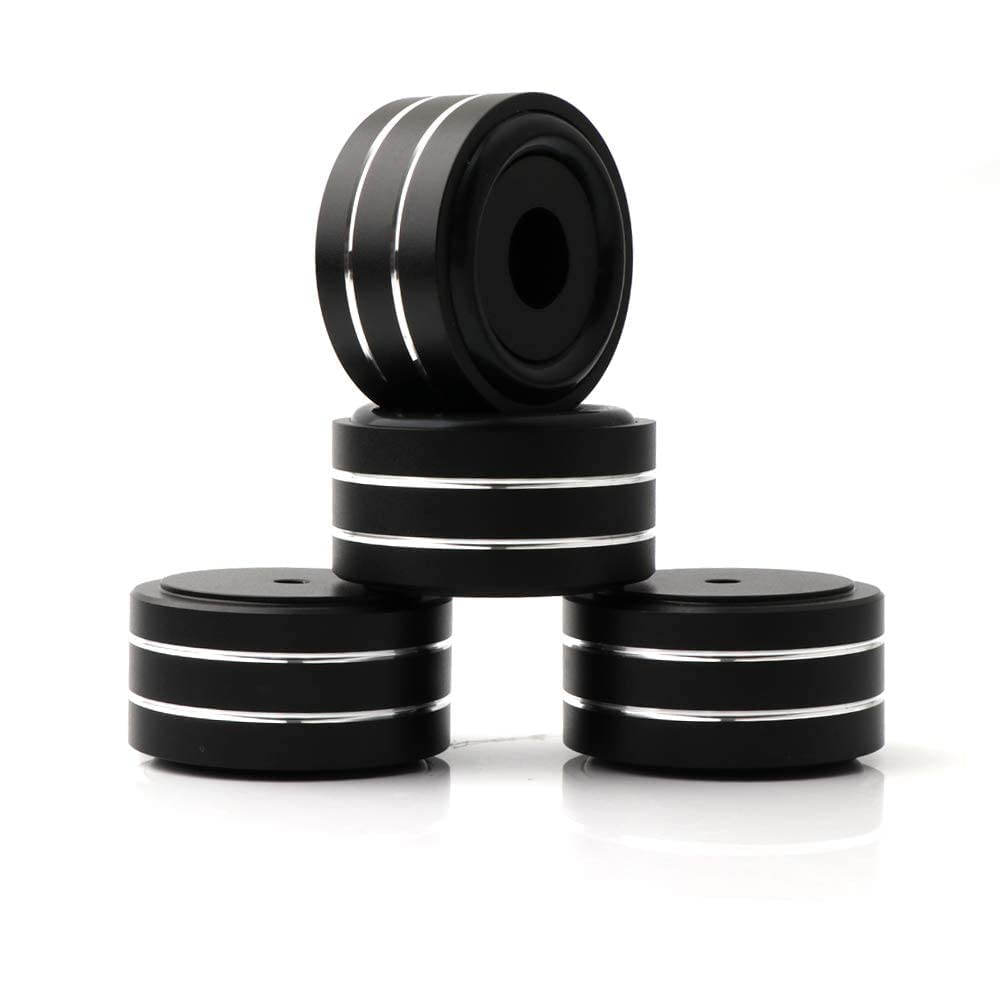 Monosaudio feet next to ruler showing 40x20mm scale and low profile benefit
