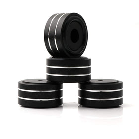 Monosaudio feet next to ruler showing 40x20mm scale and low profile benefit