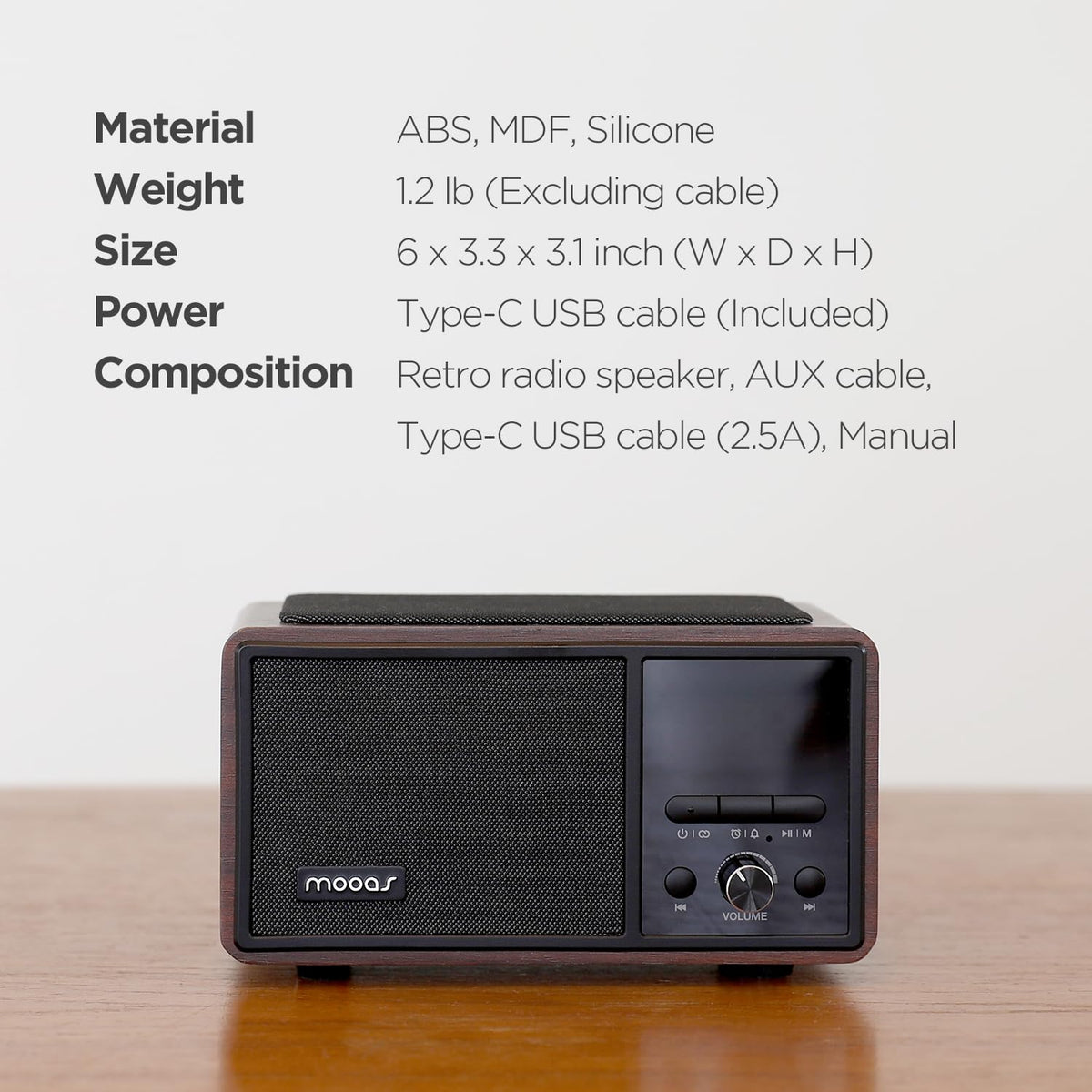 mooas next to smartphone for size comparison emphasizing compact portability