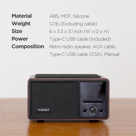 mooas next to smartphone for size comparison emphasizing compact portability