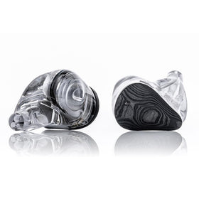 Moondrop Dusk earphones top view highlighting premium build and compact footprint.
