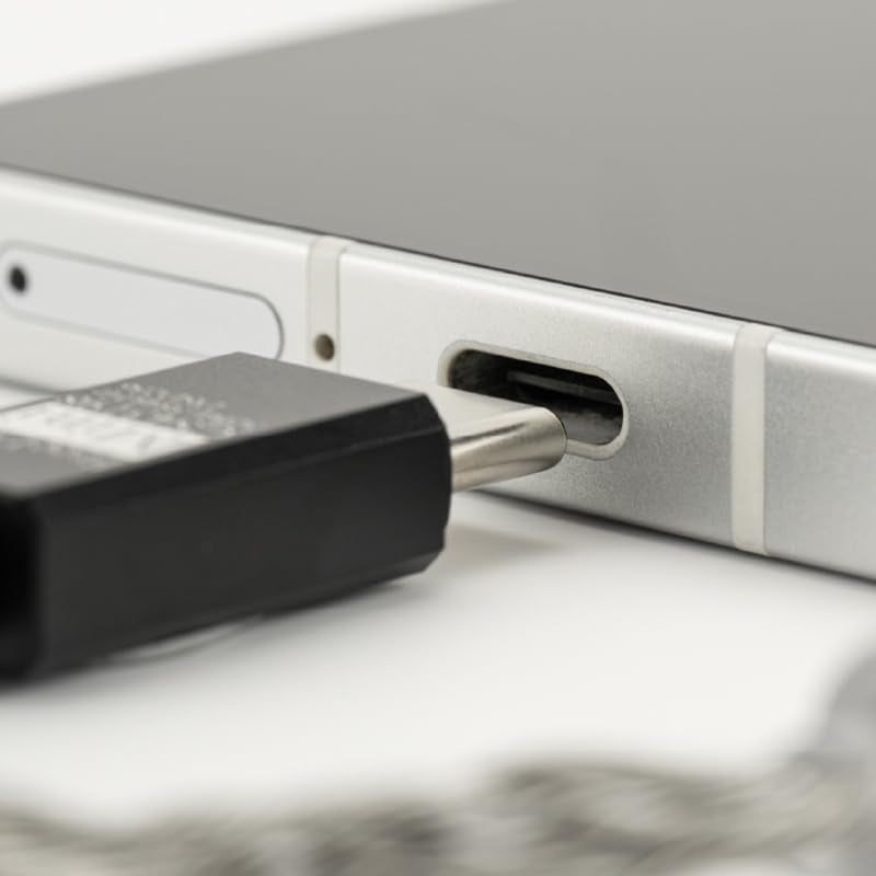 Moondrop FreeDSP Mini 3.5mm CTIA jack closeup showing mic support and reliable audio signaling
